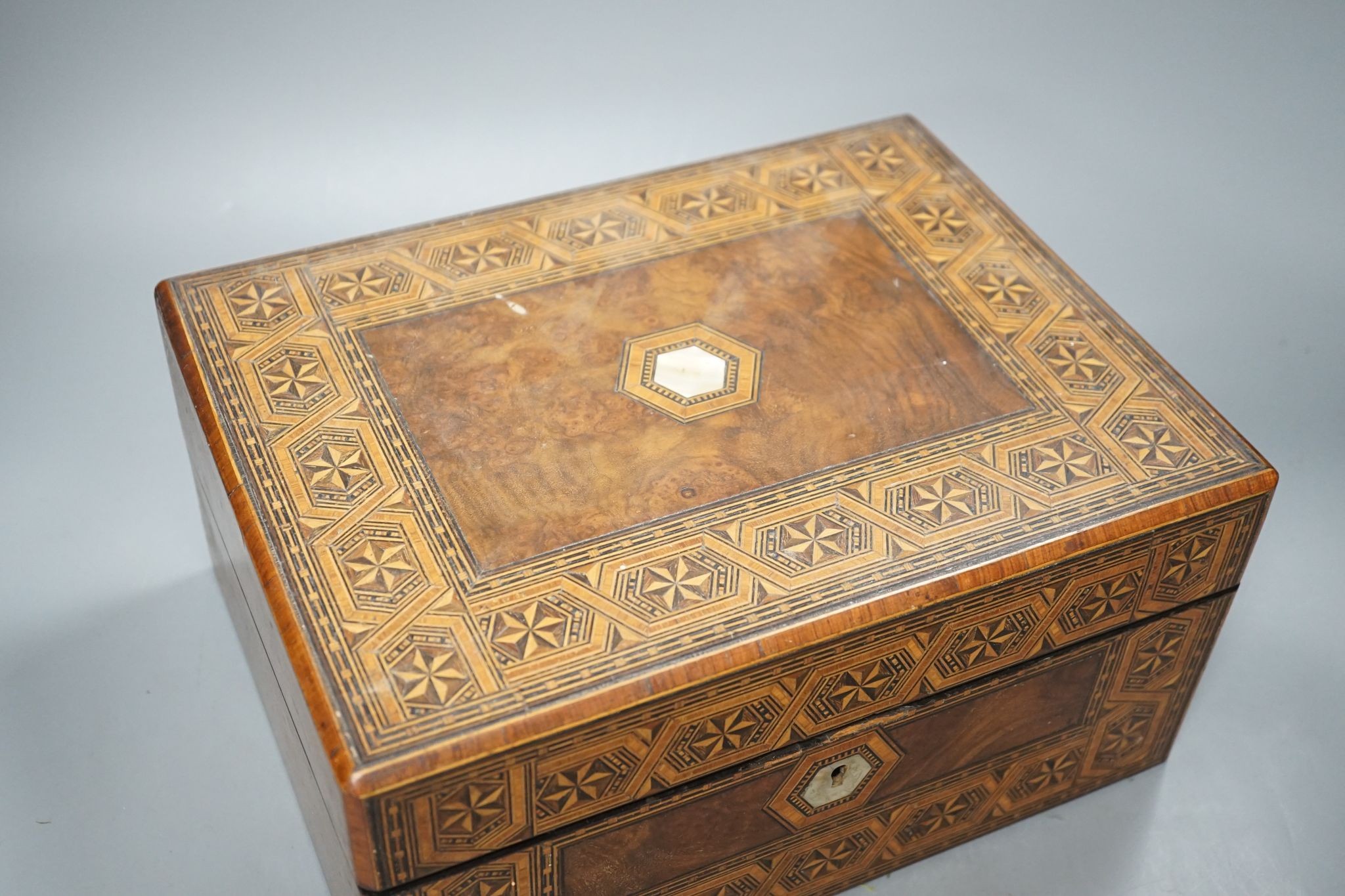 A Victorian inlaid walnut box and a Victorian black lacquer tea caddy, 30cm